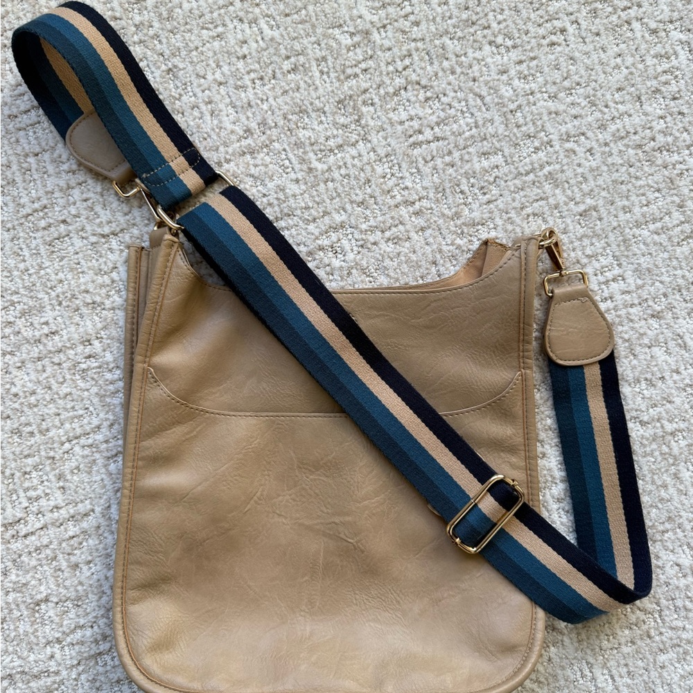 Elegant Tan Crossbody Bag with Striped Strap